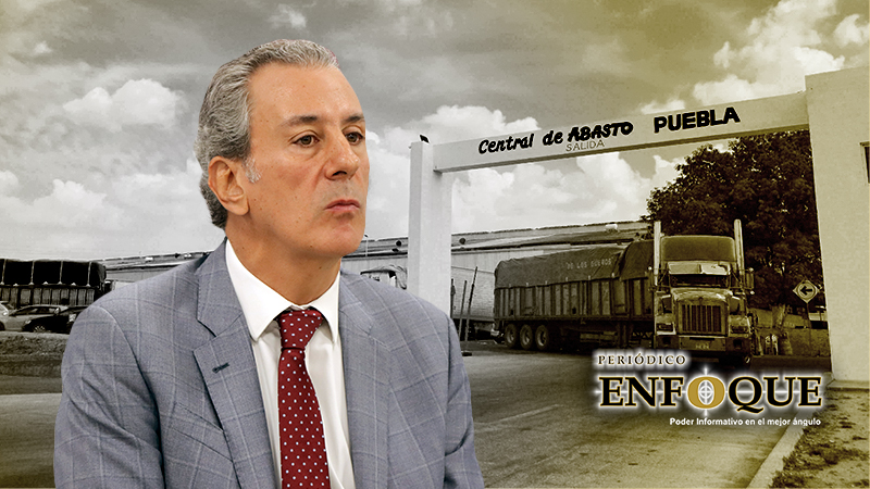 Chedraui destruye unidad en la Central de Abastos de Puebla; Arma caos por barda