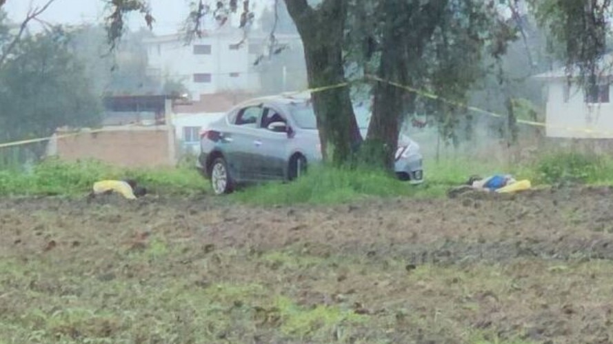Hallan tres cuerpos con huellas de violencia en Coronango, Puebla