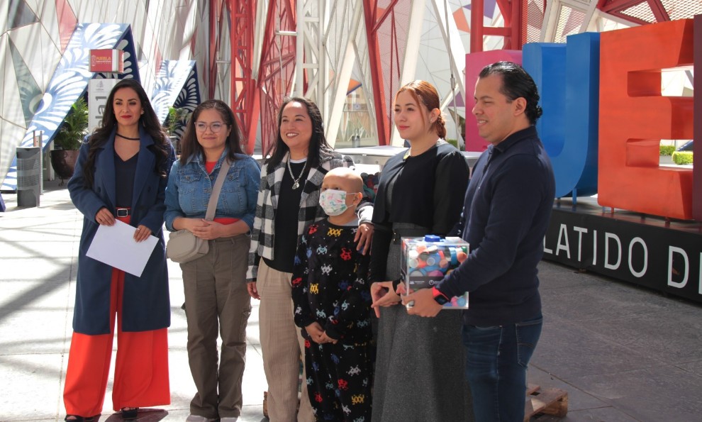 Entrega de tapitas para niños con cáncer