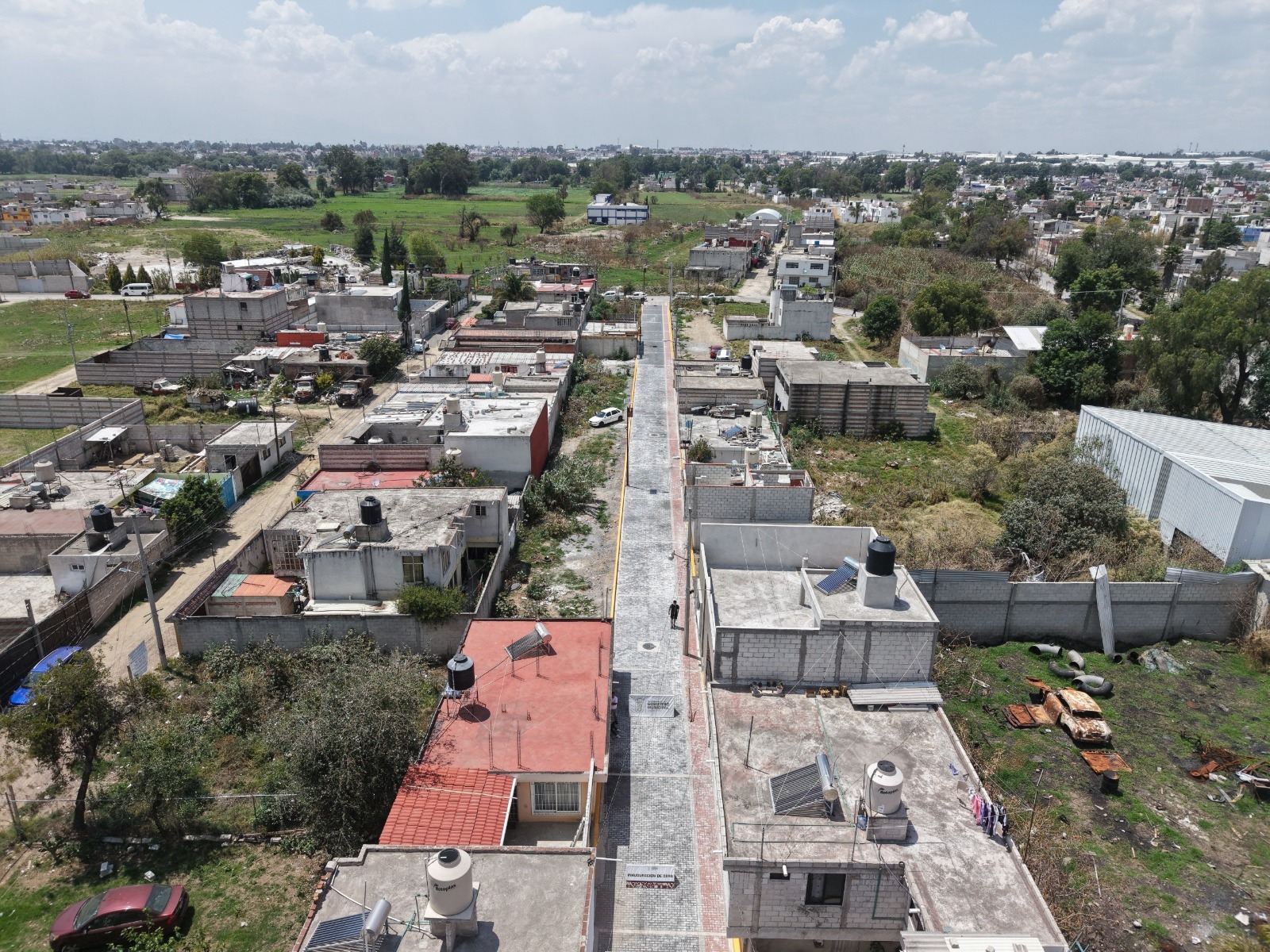 Más obra comunitaria transforma vialidades en Cuautlancingo