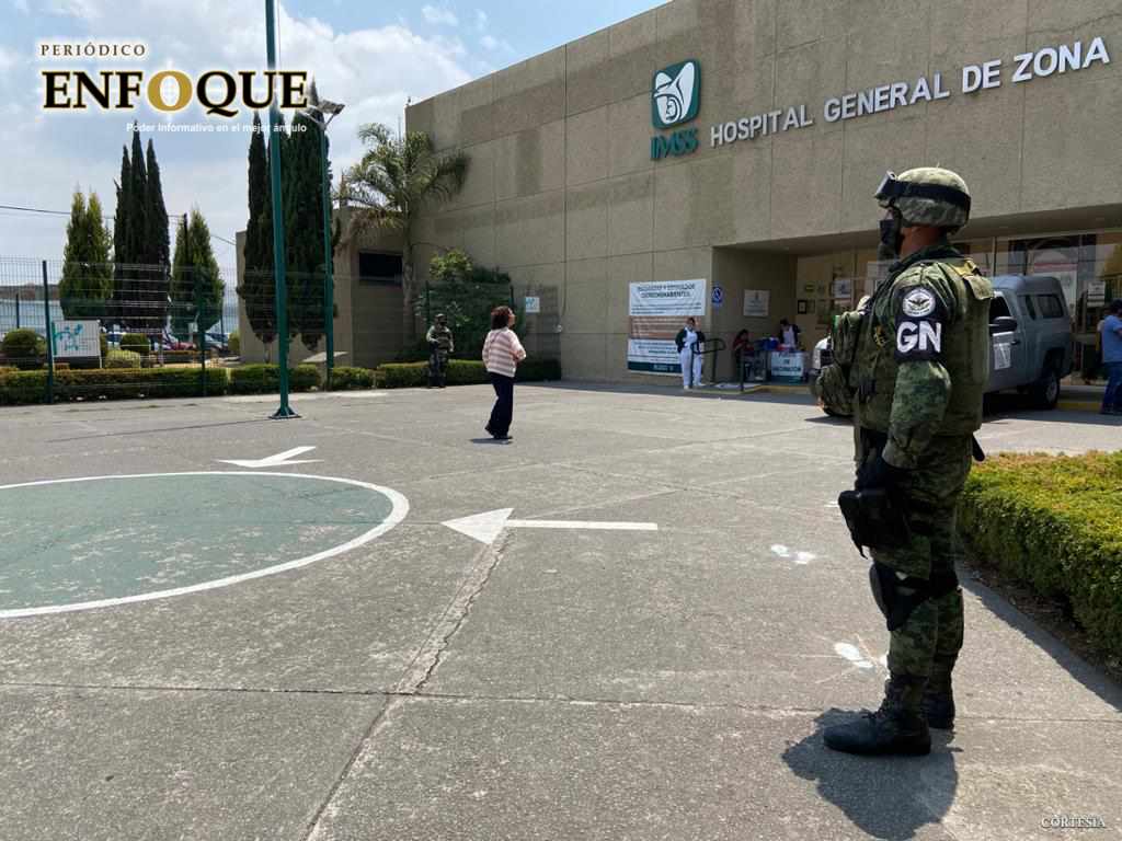 Patrulla GN hospitales para preservar el orden