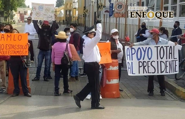 Visita de AMLO genera protestas a favor y en contra en San Pedro Cholula 