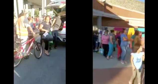 Armados y con chalecos antibalas, miembros del CJNG reparten despensas en Zapopan