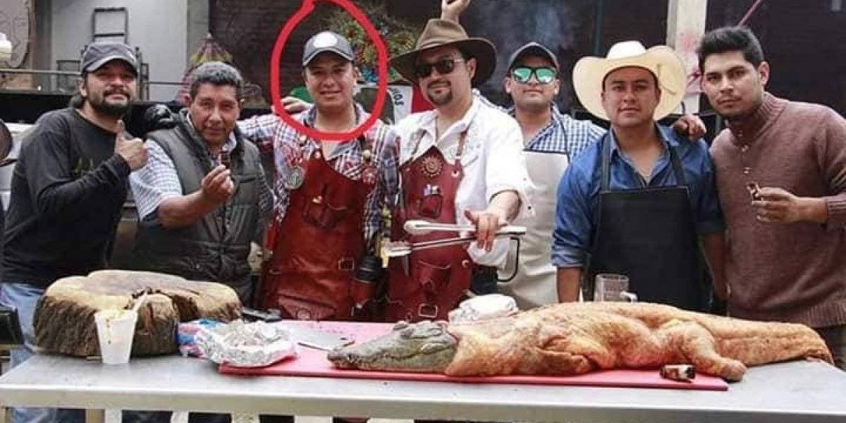 Esposo de regidora de Huejotzingo cocina cocodrilo para parrillada 