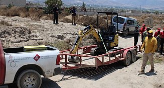 Reanudan labores por posible hallazgo de restos óseos en Palmar de Bravo