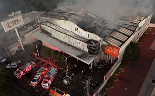 Incendio en Gran Bodega de Amalucan causado por indigente, informan