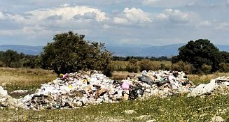 Vecinos denuncian tiradero de basura en San Lorenzo Chiautzingo