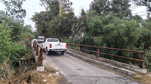 Localizan cadáver de un hombre dentro del Río Atoyac, en Nativitas