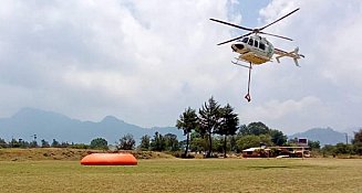 Supervisan desde el aire incendio forestal en Jilotzingo, Zacatlán