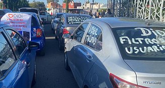 Conductores de Uber y DiDi protestan en Puebla por mejores tarifas y seguridad