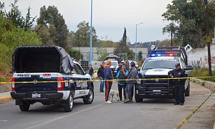 Ataque armado en Tlaxcala: Padre e hijo heridos frente a una tienda local