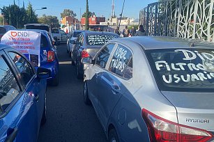 Conductores de Uber y DiDi protestan en Puebla por mejores tarifas y seguridad