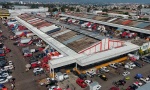 Construcción de barda en la Central de Abasto genera división entre bodegueros