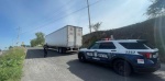 Foto: Cortesía Policías estatales resguardan un contenedor recuperado en el Periférico Ecológico.