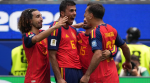 Foto: CortesÃa Jugadores de España celebran la victoria sobre Austria en el Mundial 2026.