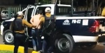 Patrulla y policías durante operativo en Zacapoaxtla.