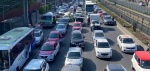 Autos circulando en avenida de Ciudad de México
