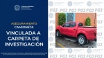 Camioneta roja asegurada por agentes de investigación en Apetatitlán