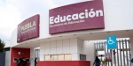 Estudiantes en salón de clases durante ciclo escolar en Puebla.